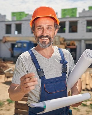 construction-worker-with-a-pencil-looking-ahead-2022-02-08-02-44-33-V59D8G7.jpg